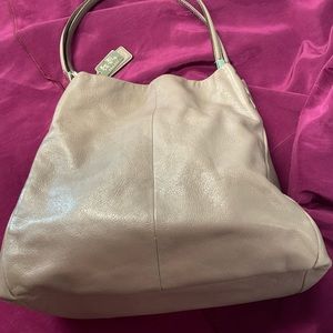 Vintage Coach Taupe Pebbled Leather Shoulder Bag With Light Purple Lining.